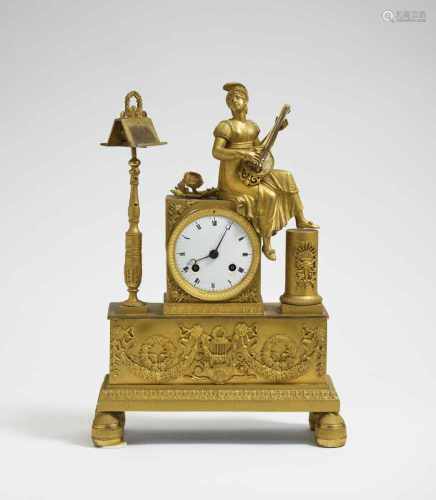 A small Charles X mantle clock