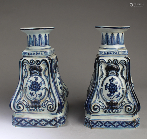 A Pair of Chinese Blue & White Candle Hold…