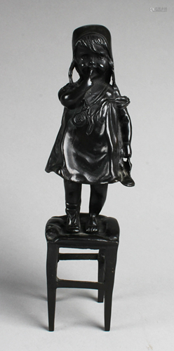 A Metallic Figurine