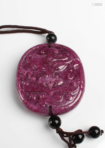 A Ruby Pendant with String