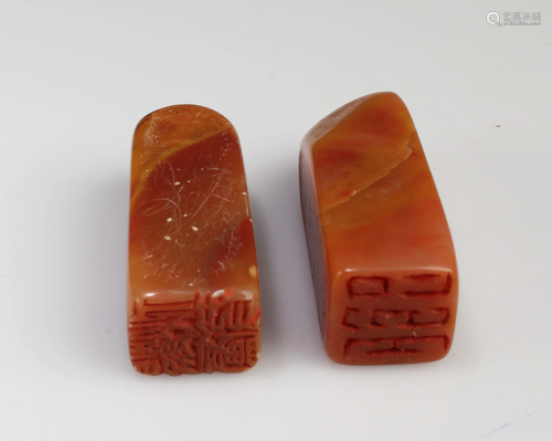 A Group of Two Soapstone Seals