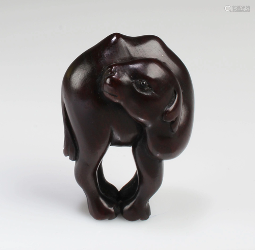 A Carved Wooden Animal Figurine