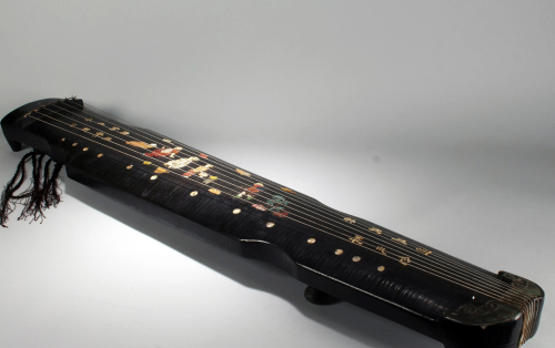 A Chinese 7-string Story-telling Guzheng
