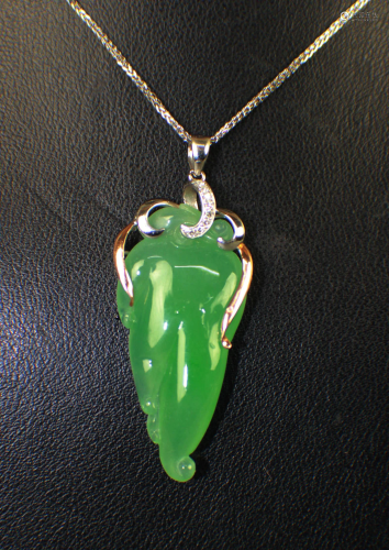 A Natural Jadeite Pendant with Y & W Gold…