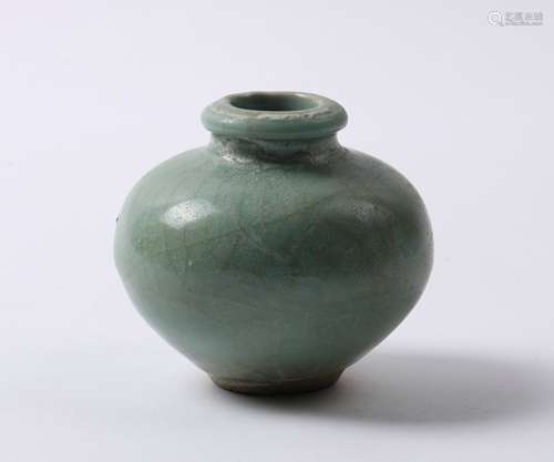 A CELADON GLAZED JAR