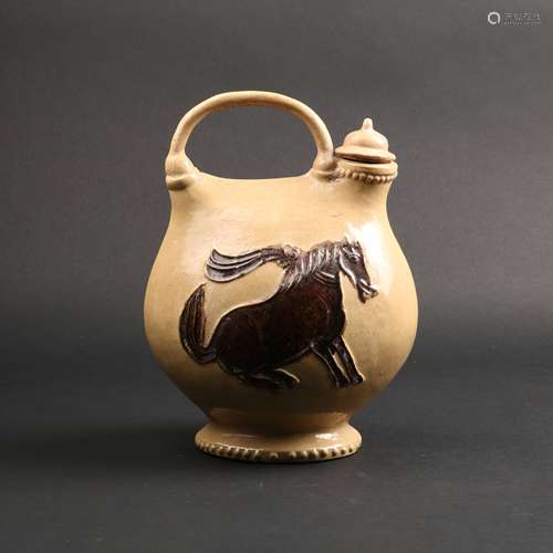 A POTTERY HORSE EWER