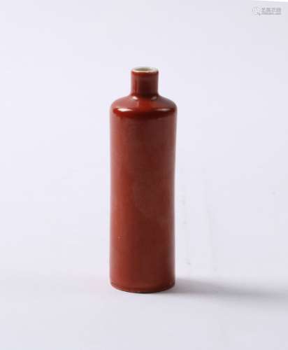 AN IRON RED SNUFF BOTTLE