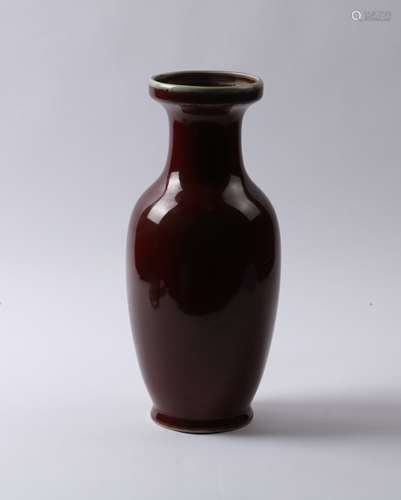 A RED GLAZED VASE