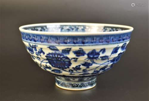 A BLUE AND WHITE FLORAL SCROLLS BOWL EARLY MING DYNASTY