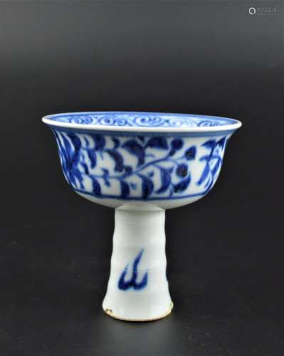 A BLUE AND WHITE STEM CUP YUAN DYNASTY AND LATER