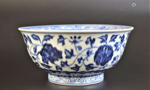 A BLUE AND WHITE FLORAL SCROLLS BOWL MING DYNASTY