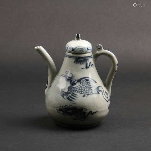A BLUE AND WHITE PEAR SHAPED EWER