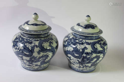 PAIR BLUE AND WHITE JARS AND COVERS