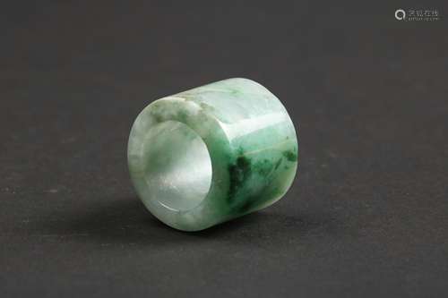 A JADEITE ARCHERS RING