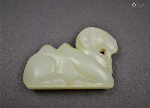 A CARVED WHITE JADE CAMEL TANG DYNASTY OR LATER