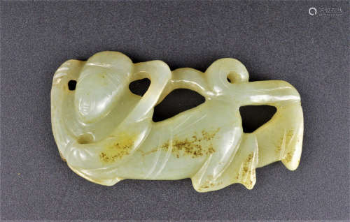 A CELADON AND RUSSET JADE APSARAS MING DYNASTY