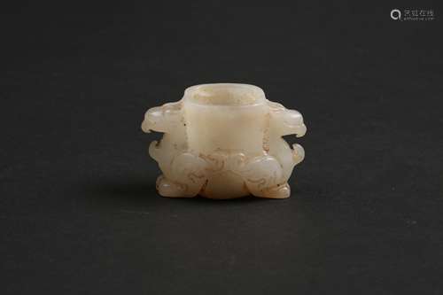 A CARVED JADE CUP