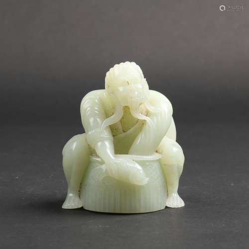 A WHITE JADE CARVING