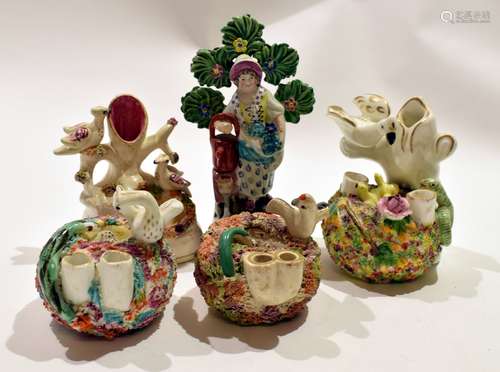 Group of five Staffordshire pen holders modelled as birds nests and a Staffordshire Walton type