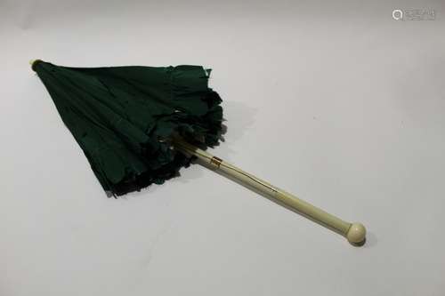 Vintage green fabric parasol with ivory shaft (cracked), circa late 19th century