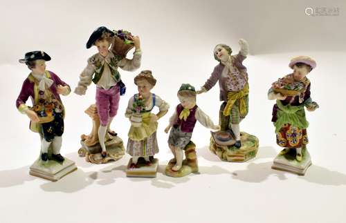 Group of six Continental figures modelled as children with flowers and models of street sellers (