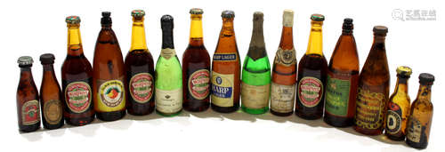 Box of various miniature beer bottles