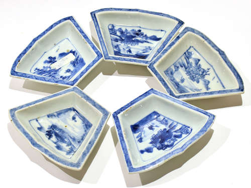 Group of five 18th century Chinese export pin trays, all with blue and white chinoiserie designs,