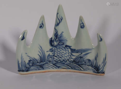 A BLUE AND WHITE BRUSH-REST MING DYNASTY