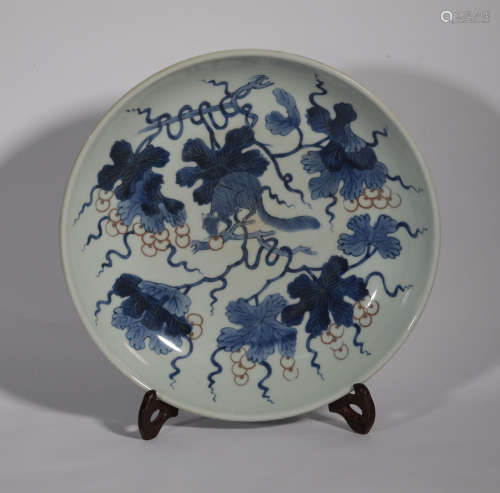 AN UNDERGLAZE BLUE AND COPPER RED PLATE