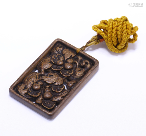 A CHINESE ALOES WOOD PENDANT, QING …