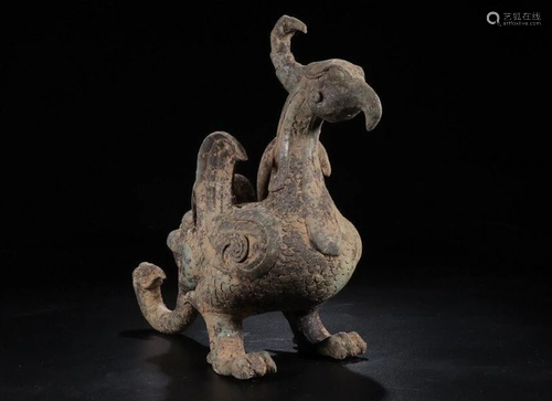 A CHINESE ARCHAIC BRONZE PHOE…