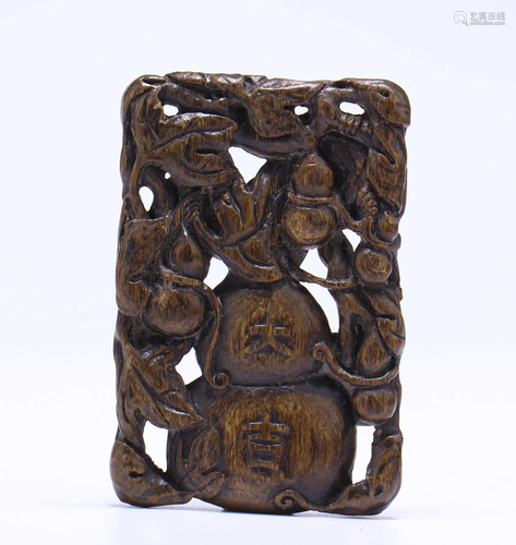 A CHINESE ALOES WOOD PENDANT, QING …