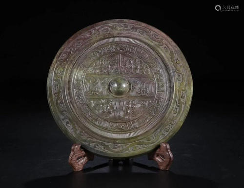 A CHINESE ARCHAIC BRONZE MIRRO…