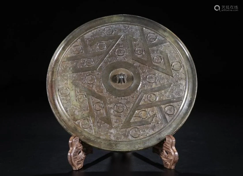 A CHINESE ARCHAIC BRONZE MIRRO…