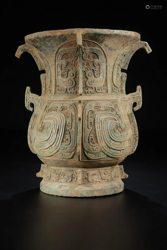 A CHINESE ARCHAIC BRONZE VASE, …