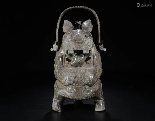 A CHINESE ARCHAIC BRONZE YOU …