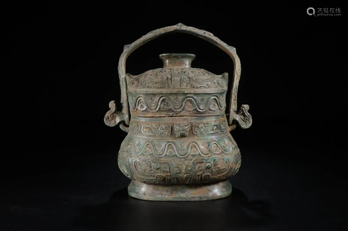 A CHINESE ARCHAIC BRONZE YOU …