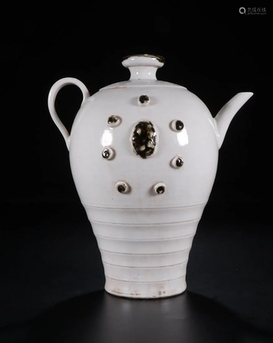 A CHINESE WHITE GLAZED WINE POT, SON…