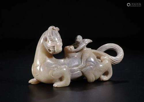 A CHINESE JADE FIGURE OF MYTHICAL BE…