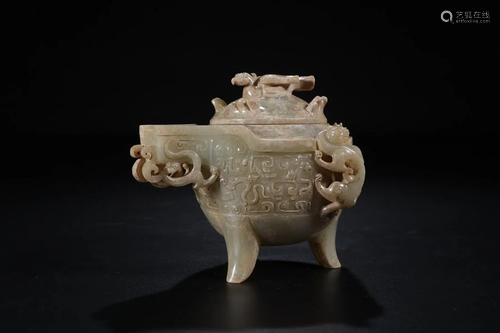 A CHINESE JADE TRIPOD WINE VESSEL WIT…