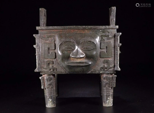 A CHINESE ARCHAIC BRONZE DING …