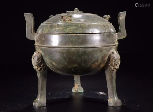 A CHINESE ARCHAIC BRONZE DING …