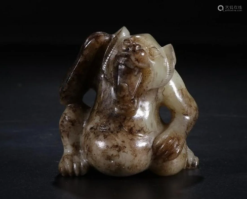 A CHINESE WHITE JADE BEAR, HOU DYNASTY