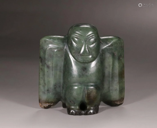 A CHINESE ANCIENT JADE STATUE, H…