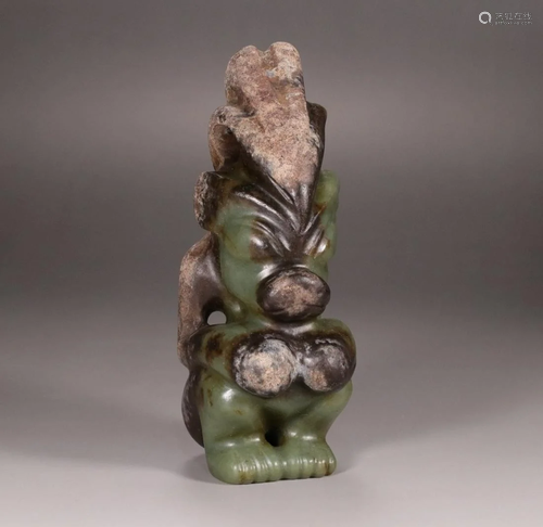 A CHINESE ANCIENT JADE STATUE, H…