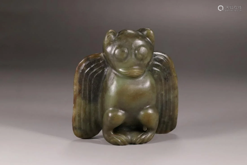 A CHINESE ANCIENT JADE STATUE, H…