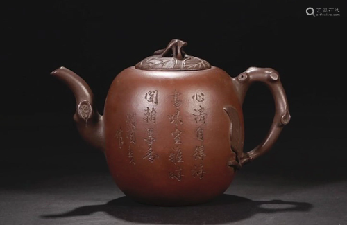 A CHINESE YIXING GLAZED TEA POT WITH M…