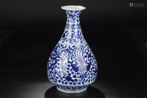 A CHINESE BLUE AND WHITE VASE WITH …