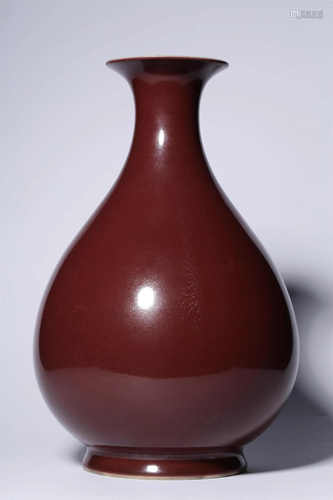 A CHINESE RED GLAZED VASE WITH QIA…