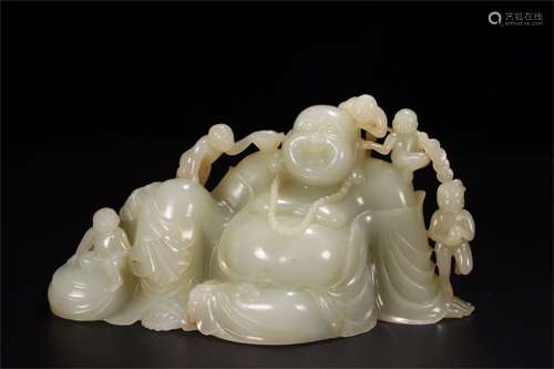 A Chinese Carved Jade Figure of Buddha